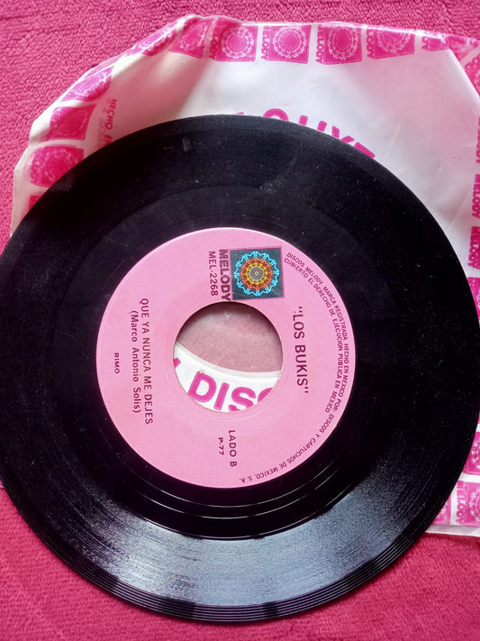 Los Bukis – Una Noche Como Esta / Que Ya Nunca Me Dejes. 7" en buen estado. tienda de discos en mexico formato muerto