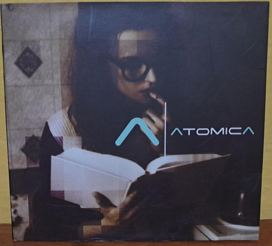 Atómica. Cd en buen estado. formato muerto
