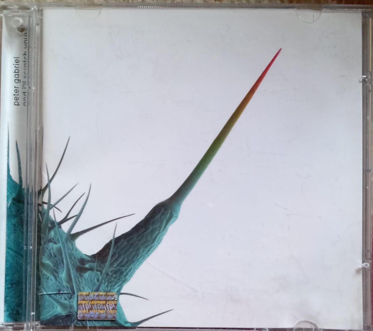 Peter Gabriel – And I'll Scratch Yours (CD en excelente estado).
