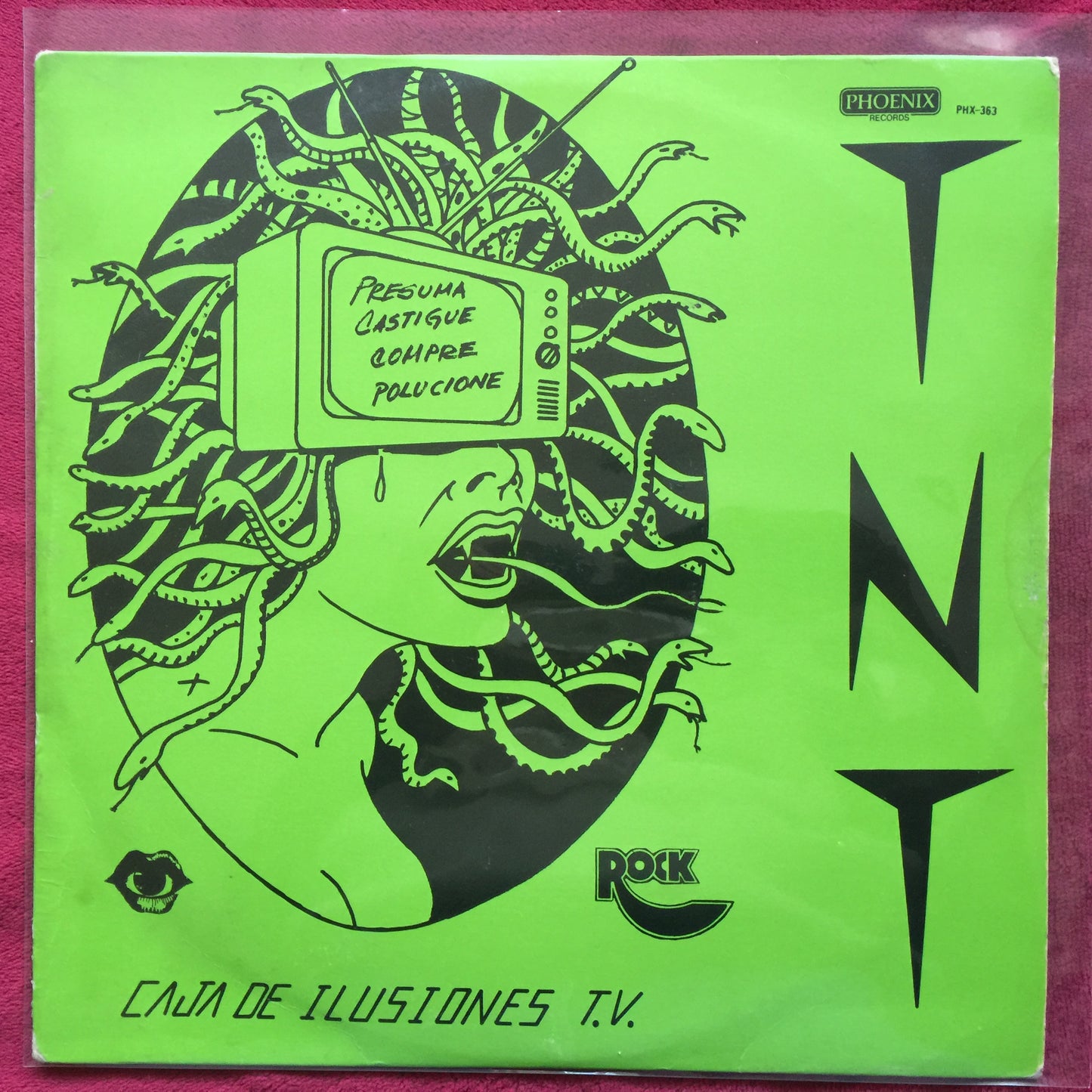 T.N.T. – Caja De Ilusiones T.V.. Vinilo en buen estado. formato muerto