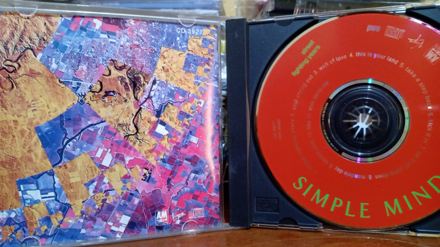 Simple Minds – Street Fighting Years. Cd en buen estado. tienda de discos en méxico formato muerto