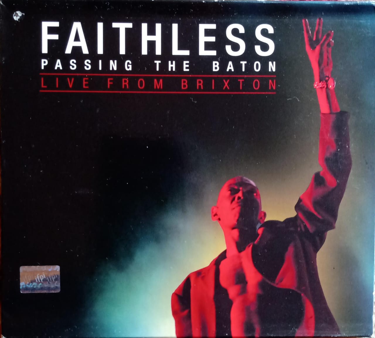 Faithless – Passing The Baton - Live From Brixton. Cd y DVD en buen estado.