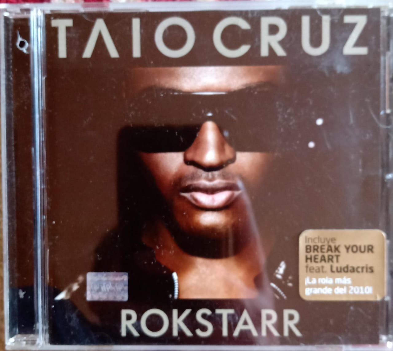 Taio Cruz – Rokstarr (CD en excelente estado).