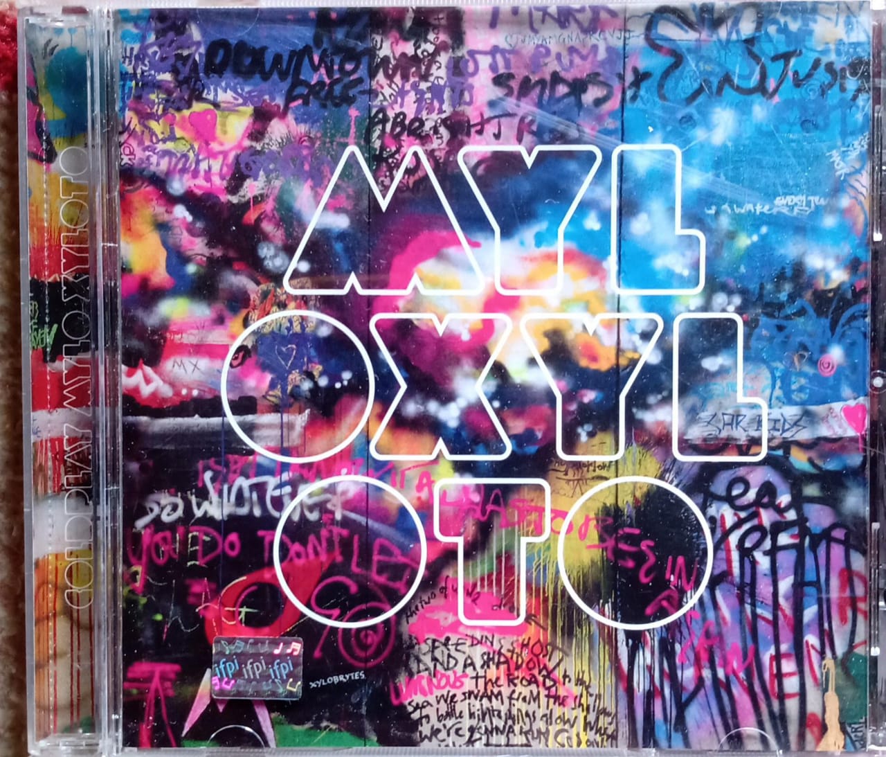Coldplay – Mylo Xyloto (CD en excelente estado).
